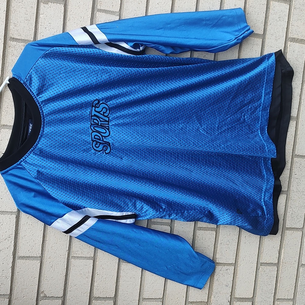 Blue Shirt (says sports)